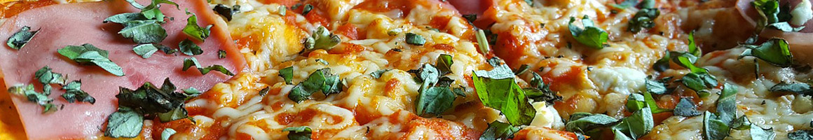 Eating Italian Pizza at Arlington Cafe restaurant in Arlington, MA.